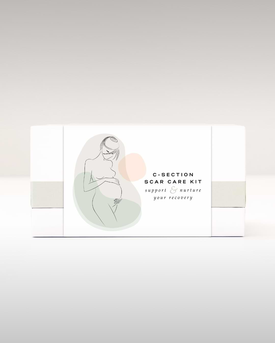 Minimalist product packaging for the Nokori C-Section Scar Care Kit, featuring a soft-line illustration of a pregnant woman with abstract pastel shapes and the tagline “support & nurture your recovery.”