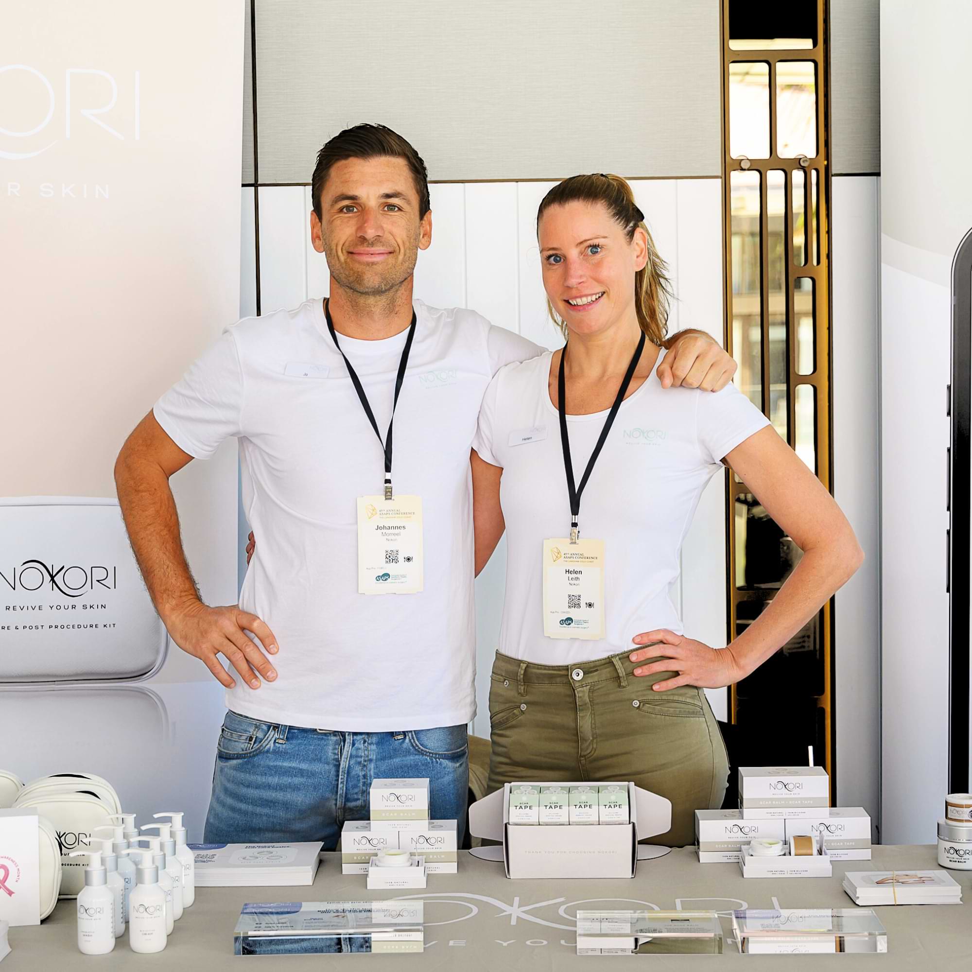 Jo and Helen standing at the Nokori booth with products.